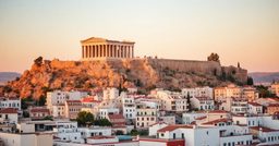 Acropole et Parthénon surplombant les maisons blanches d'Athènes
